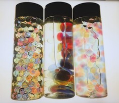clear bootles filled with liquid and translucent materials